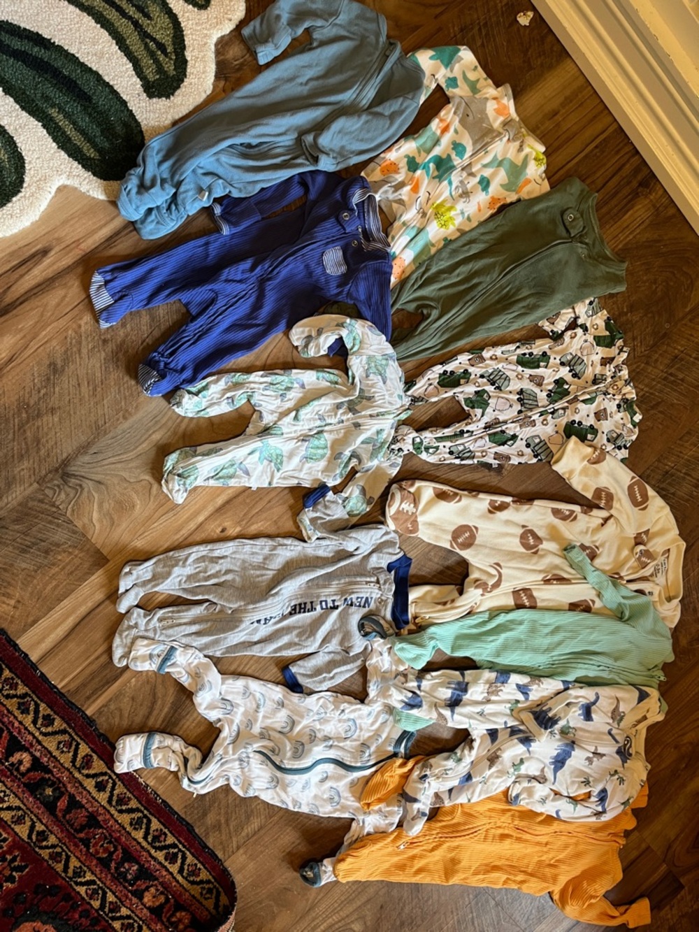 Lot of 12 newborn-0-3 bay boy onesies/pajamas Caden Lane, Noomie, Dreamland